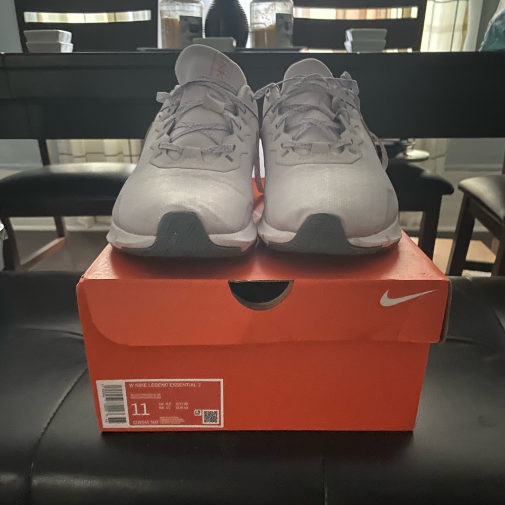 Nike Legend Essential 2 worn twice no wholes,tears light stain pictured